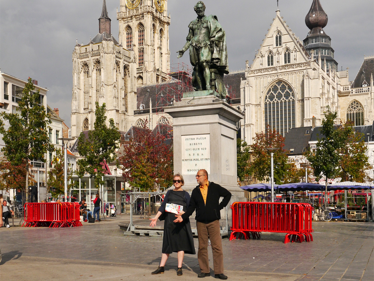 Hannah and Vikram Prakash in front of the Rubens statue and the cathedral, Antwerp.