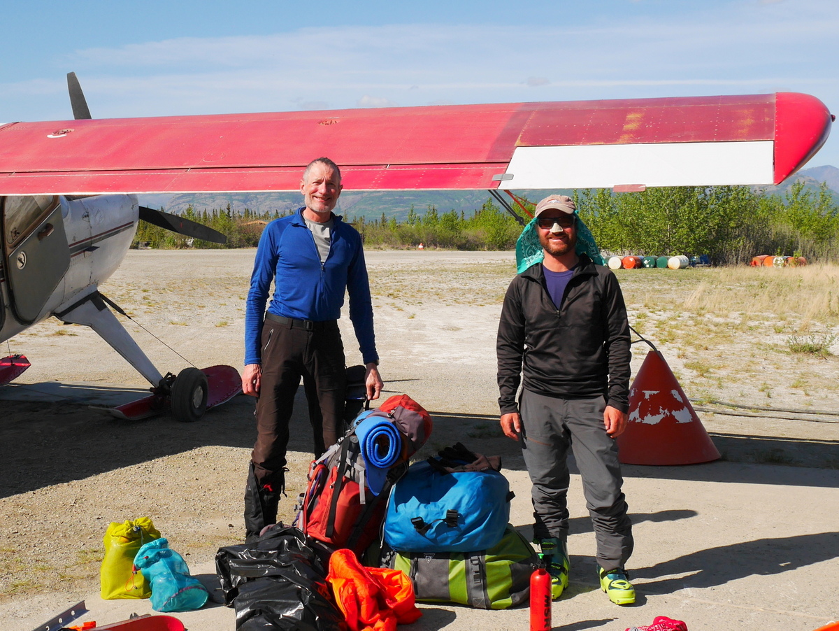 Back on solid ground at Kluane Lake airstrip. Brian permits himself to crack a smile. We had skied and climbed about 60 miles and gained and lost 20,000'. Now for a shower, a change of clothing and a proper meal!